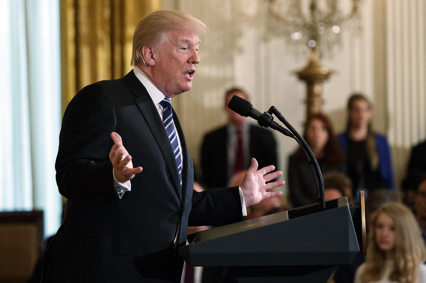 Image: Trump speaks during an event in the East Room of the White House