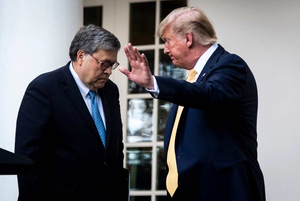 Image: President Donald Trump and Attorney General William Barr leave the Rose Garden on July 11, 2019.