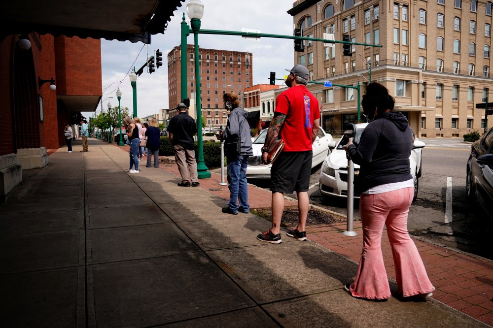 Image: People wait to file for unemployment at the Arkansas Workforce Center in Fort Smith on April 6, 2020.