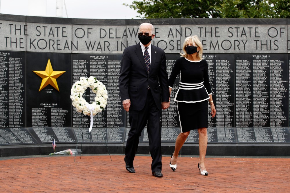 Image: Joe Biden and his wife, Jill, lay a wreath at the Veterans Memorial Park at the Delaware Memorial Bridge on May 25, 2020.