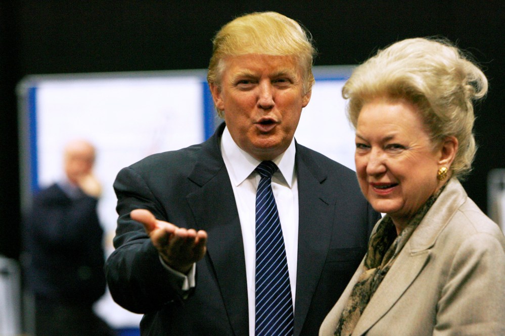 Image: FILE PHOTO: Donald Trump gestures as he stands next to his sister Maryanne Trump Barry, during a break in proceedings of the Aberdeenshire Council inquiry into his plans for a golf resort, Aberdeen
