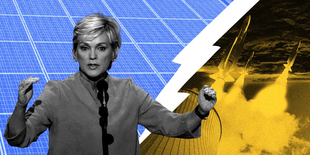 Image: Jennifer Granholm speaks in front of a divided background, one half has solar panels and the other has nuclear missiles.