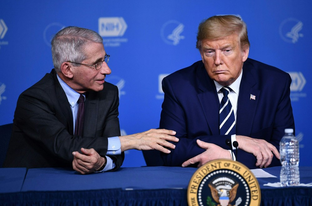 Image: President Donald Trump and Anthony Fauci, director of the NIH National Institute of Allergy and Infectious Diseases attend a meeting at the National Institutes of Health in Bethesda, Maryland