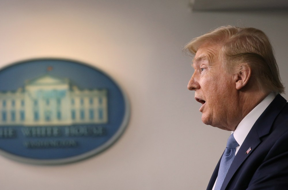 Image: President Donald Trump holds a news briefing on the coronavirus disease (COVID-19) while accompanied by members of the task force at the White House
