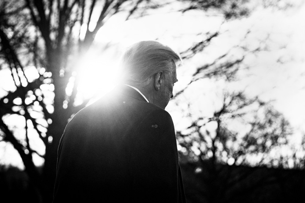 President Donald Trump walks on the South Lawn of the White House before boarding Marine One on Jan. 20, 2021.