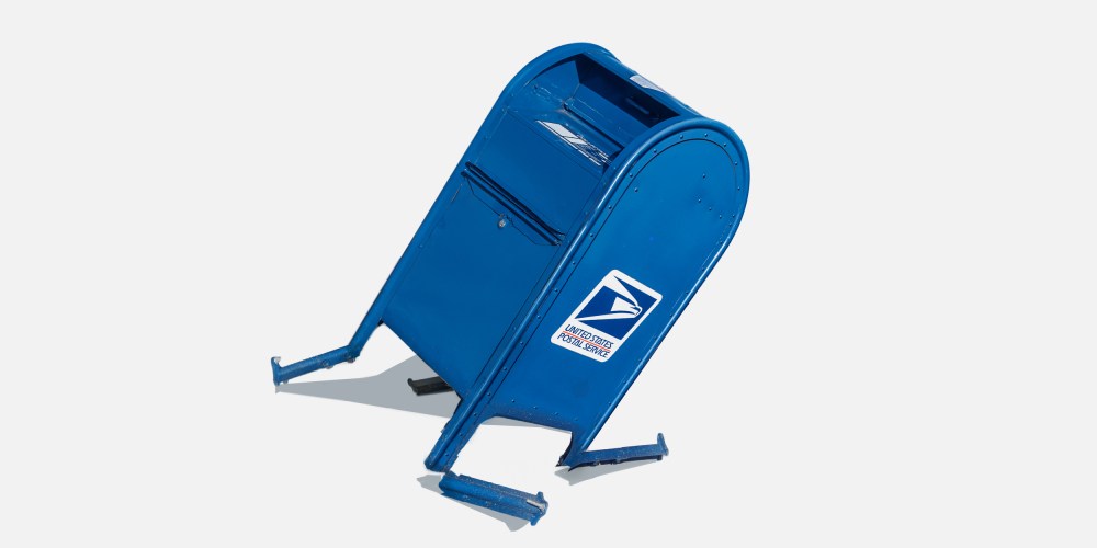 Photo illustration of a broken United States Postal Service mailbox.