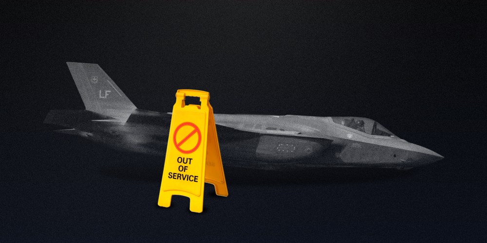 Photo illustration of the F-35 II Lightning aka the Joint Strike Fighter in a dim room next to a yellow sign that reads,"OUT OF ORDER".