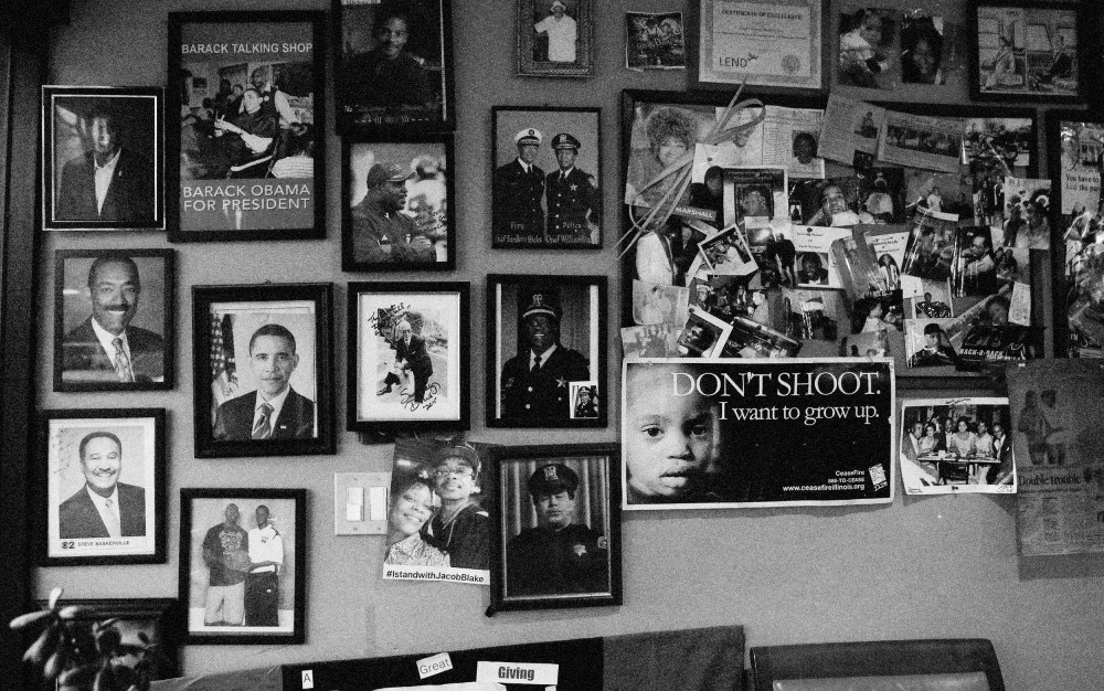 Image: Photographs at the Ebony Barber Shop in the Fifth Ward, a historic Black community, in Evanston, Illinois, on March 17, 2021.