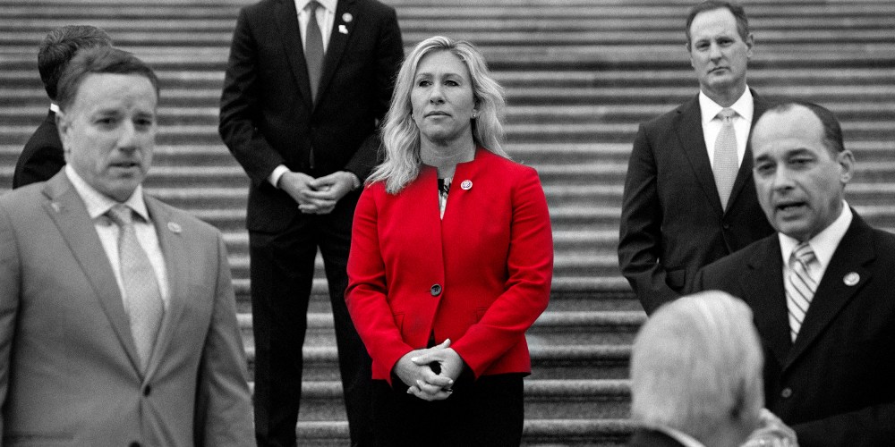 Image: Marjorie Taylor Greene stands alongside fellow first-term Republican members of Congress on the steps of the US Capitol.
