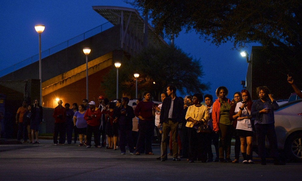 Image: Voters wait in line to cast their ballot.
