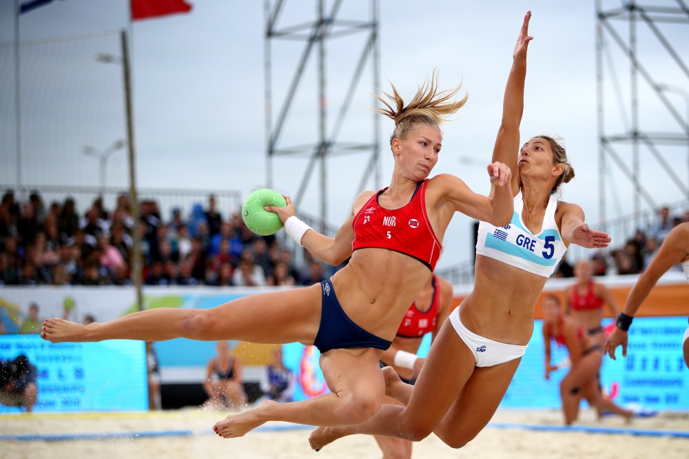 Image: Norway's Marielle Mathisen plays a shot during the 2018 Women's Beach Handball World Cup Final against Greece in Kazan, Russia.