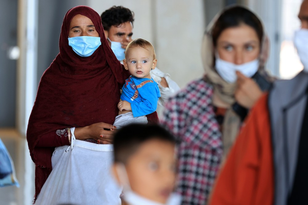 Image: Afghan Refugees Arrive At Dulles Airport Outside Nation's Capital