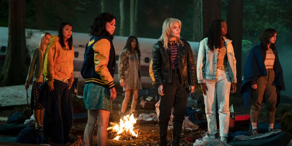 Image: A still from the series,"Yellowjackets" showing a group of girls in a forest.