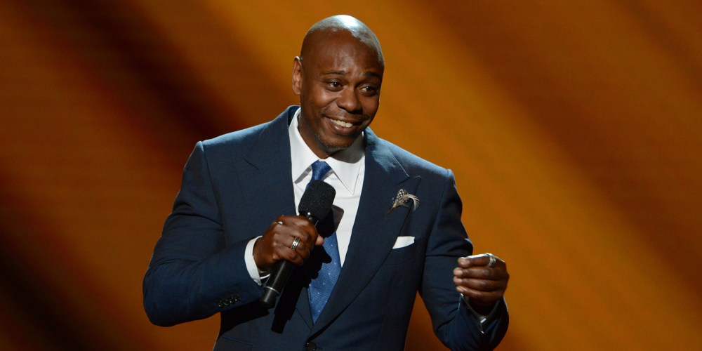 Image: Dave Chappelle on stage.