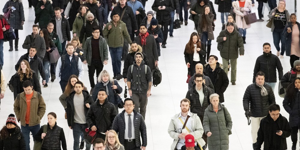 Image: Commuters walk along a corridor in the World Trade Center, New York.