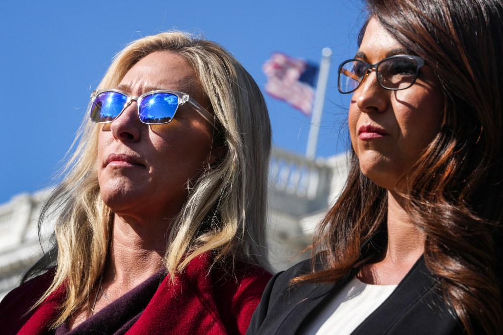 Reps. Marjorie Taylor Greene, R-Ga., left, and Lauren Boebert, R-Colo., attend a news conference outside the Capitol on Nov. 3, 2021.