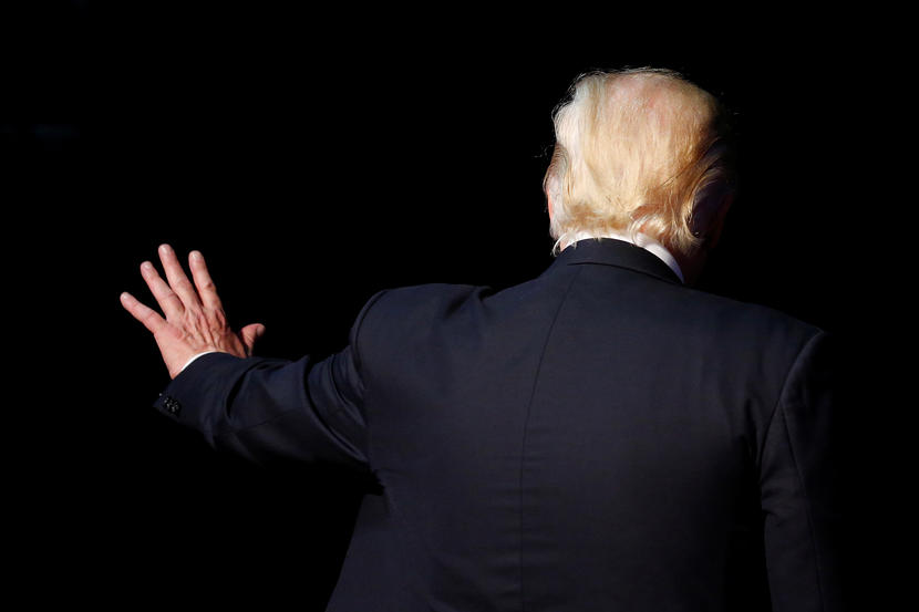 Republican presidential nominee Donald Trump waves following a campaign rally in Toledo