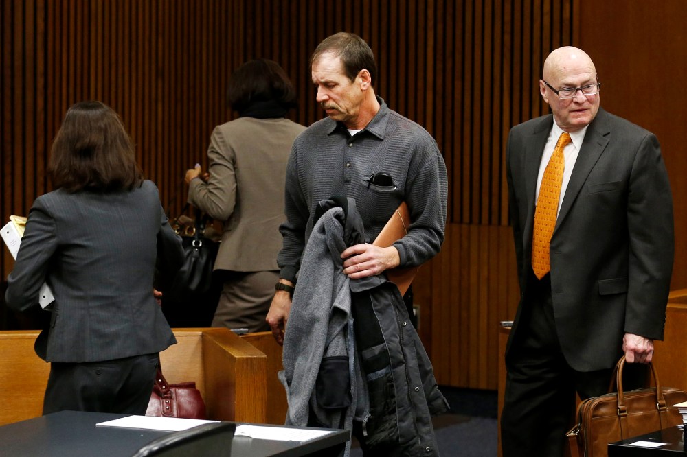 Theodore Wafer and his attorneys leave the courtroom after his arraignment in Detroit, Jan. 15, 2014.
