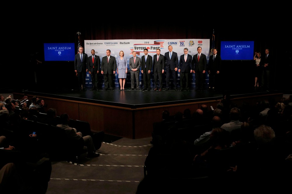 Eleven of the declared 2016 Republican U.S. presidential candidates pose together on stage before the start of the the Voters First Presidential Forum in Manchester (Photo by Brian Snyder/Reuters)