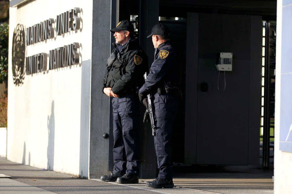 United Nations security officers stand guard outside the U.N. European headquarters in Geneva, Switzerland, Dec. 10, 2015. (Photo by Pierre Albouy/Reuters)