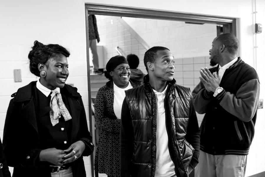 A group of Normandy High School students and a parent tour Normandy High School, where hundreds of students transferred from over the summer.