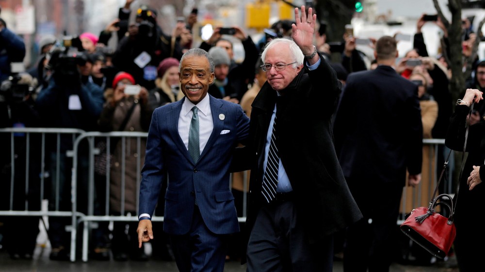 Senator from Vermont and Democratic presidential hopeful Bernie Sanders (R) arrives at Sylvia's restaurant in Harlem and is greeted by Reverend Al Sharpton in New York, N.Y., on Feb. 10, 2016. (Photo by Peter Foley/EPA)