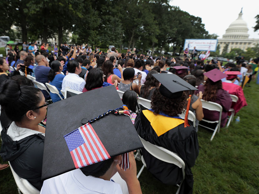DREAMers (Development, Relief, and Education for Alien Minors) listen to speakers during a "United we Dream," rally on Capitol Hill in Washington, Wednesday, July 10, 2013.  (Photo by Alex Brandon/AP)