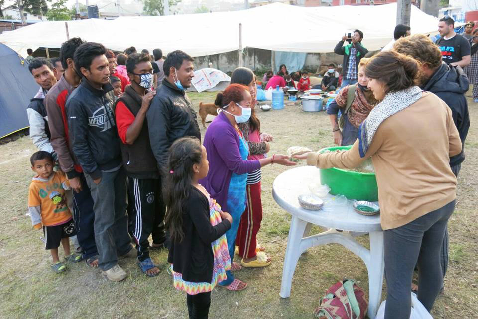 A group of volunteers with Chabad-Lubavitch of Nepal distribute hot food to hundreds of hungry Nepalese citizens on Wednesday, April 29 in Kathmandu, Nepal. (Photo by Chabad.org/Chabad of Nepal)