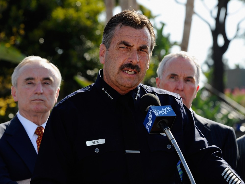 File Photo: Los Angeles Police Department Chief Charlie Beck (C) speaks during a news conference at Los Angeles Dodger Stadium on April 14, 2011 in Los Angeles, California. (Photo by Kevork Djansezian/Getty Images/File)