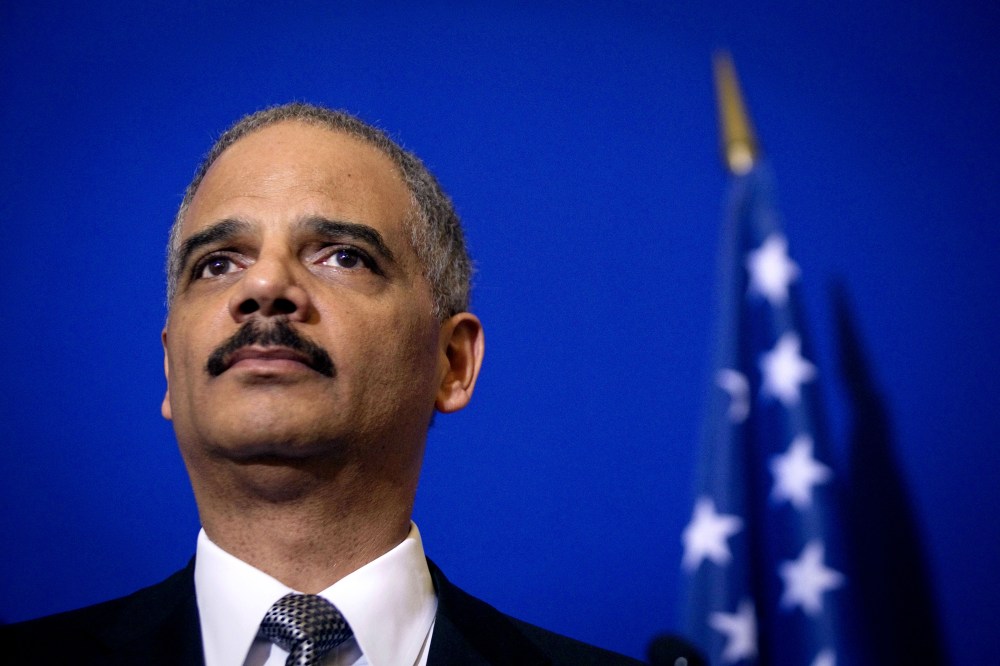 US General Attorney Eric Holder listens during a press conference following a meeting on May 9, 2011 at the Interior ministry Place Beauvau in Paris.