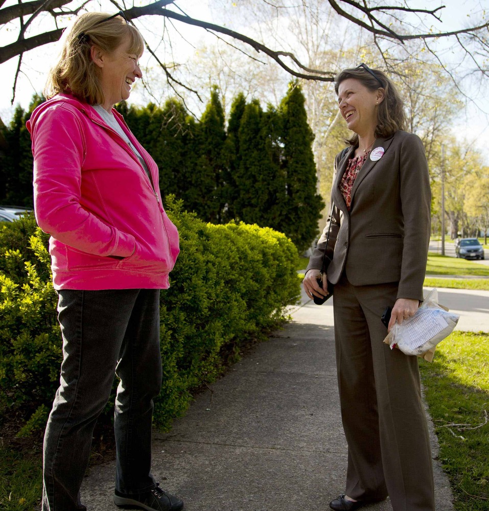 Lori Compas (right), talking to a voter during her campaign for Wisconsin state senate.