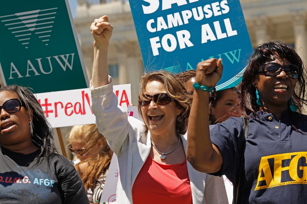National Organization of Women (NOW) President Terry O'Neill (C) participates in a rally in support of the Violence Against Women Act (VAWA) on Capitol Hill June 26. NOW, the National Task Force to End Sexual Assault and Domestic Violence Against Women...