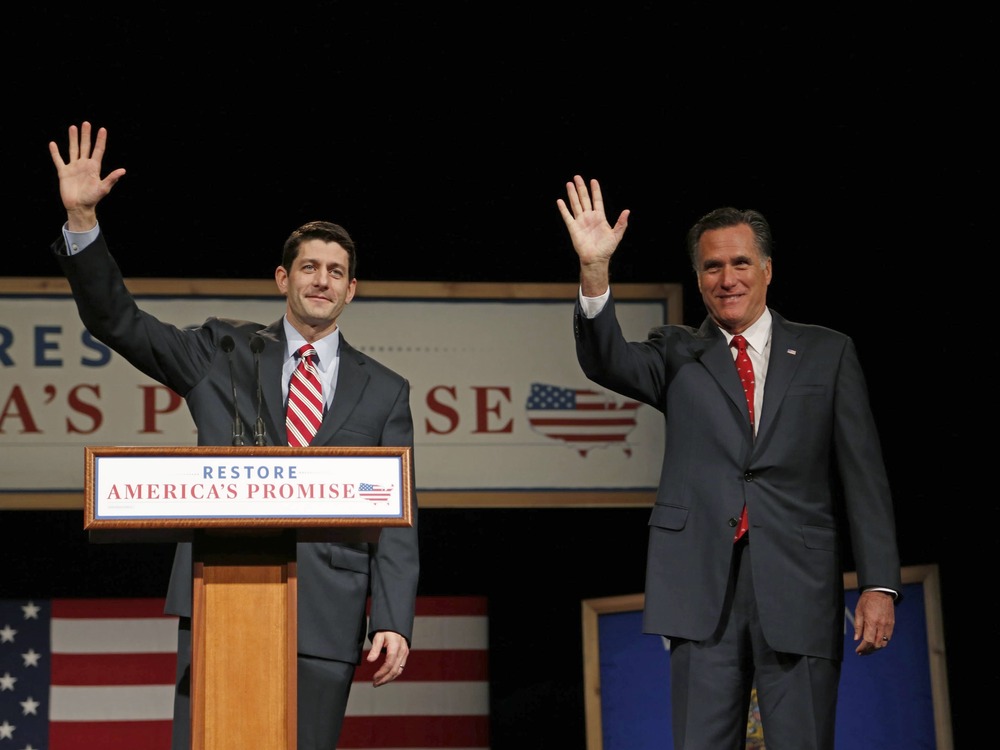 House Budget Chairman Paul Ryan (L) (R-WI) introduces U.S. Republican presidential candidate Mitt Romney (R) as he addresses supporters at Lawrence University during a campaign stop in Appleton, Wisconsin, in this March 30, 2012 file photo. Romney...