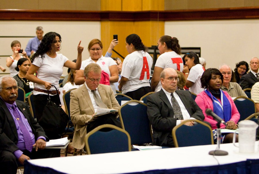 Mayra Rangel, 32, from Blout County, Alabama, protests during a briefing on the effects of state immigration laws.