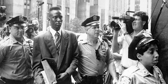 This film image released by Sundance Selects shows accused rapist Yusef Salaam being escorted by police in New York in 1990. Salaam is the subject of the documentary, "The Central Park Five" (Photo: AP Photo/Sundance Selects, NY Daily News)