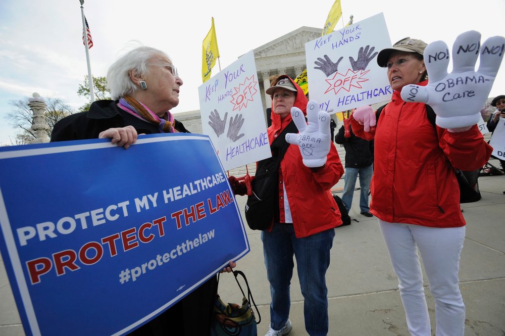 "Obamacare"  supporter Margot Smith (L) of California pleads her case with legislation opponents Judy Burel (2nd R) and Janis Haddon, both of Georgia, at the U.S. Supreme Court in Washington, March 28, 2012.