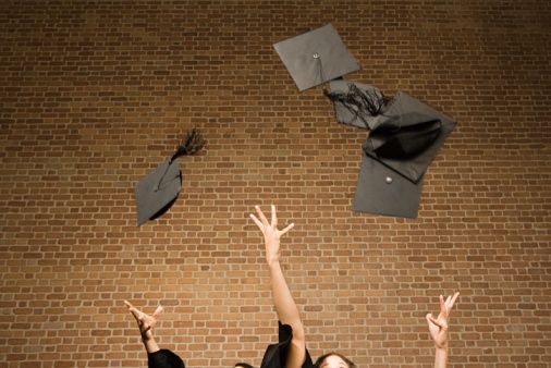 Graduates throwing their mortar boards, school, graduation, celebration