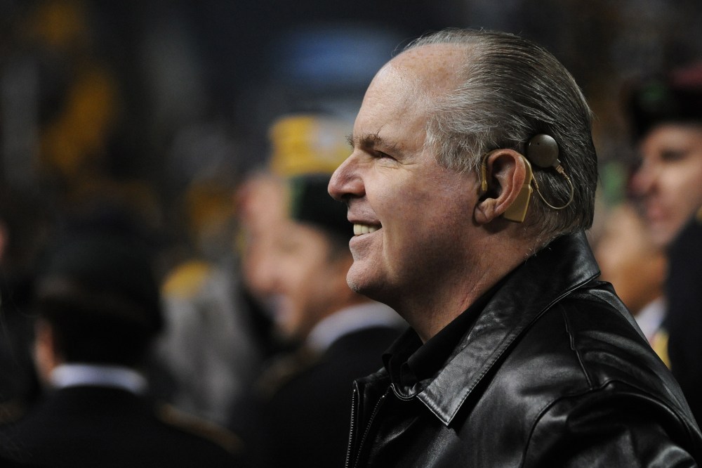 Rush Limbaugh looks on from the sideline before a Baltimore Ravens game, Nov. 6, 2011.