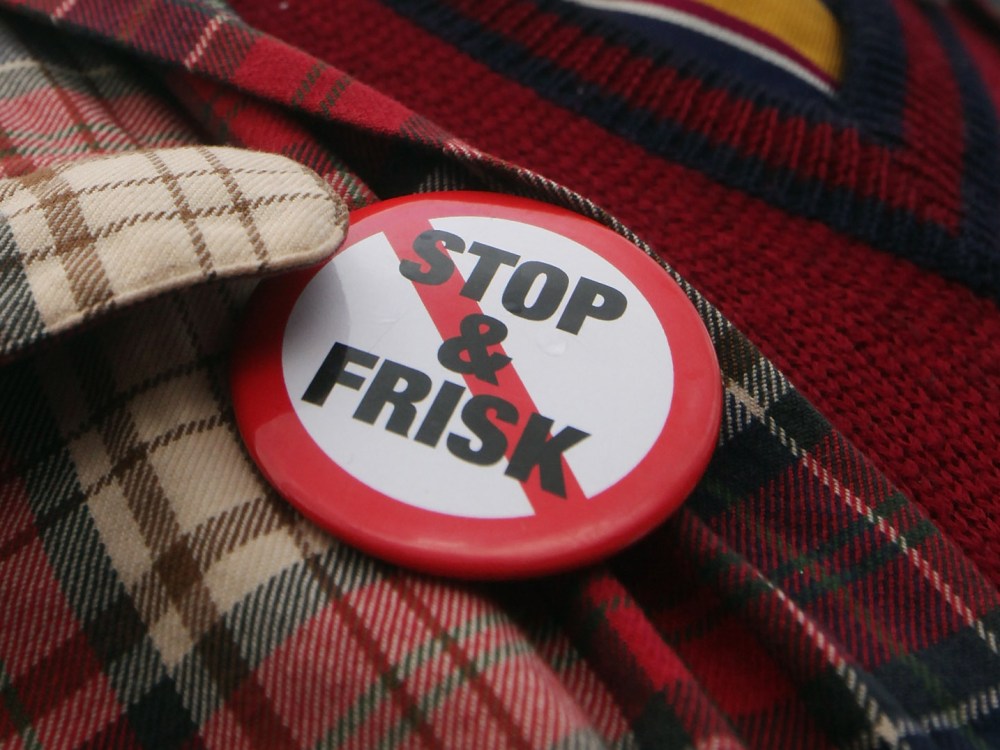 File Photo: An opponent of the New York Police Department's controversial "stop-and-frisk" policy march on January 27, 2012 in New York City. (Photo by Mario Tama/Getty Images/File)