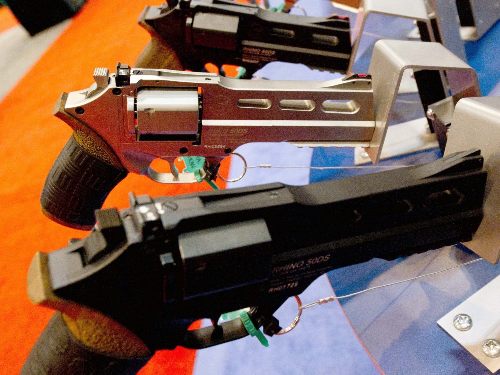 File Photo: Rhino 500 handguns are on display at the National Rifle Association (NRA) Annual Meetings and Exhibits on April 14, 2012 in St. Louis, Missouri. (Photo by Karen Bleier/AFP/Getty Images, File)