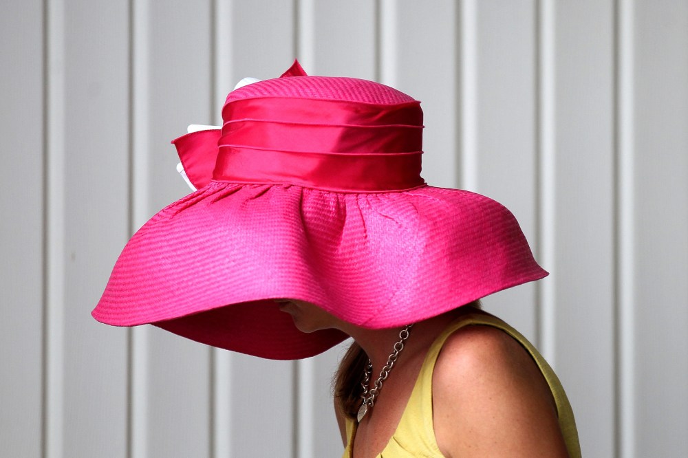 Hats like this one from May 5, 2012 may be popular at the Kentucky Derby at Churchill Downs, but all hat and no cattle may make it difficult for Mitch McConnell to win the votes of Kentucky women.