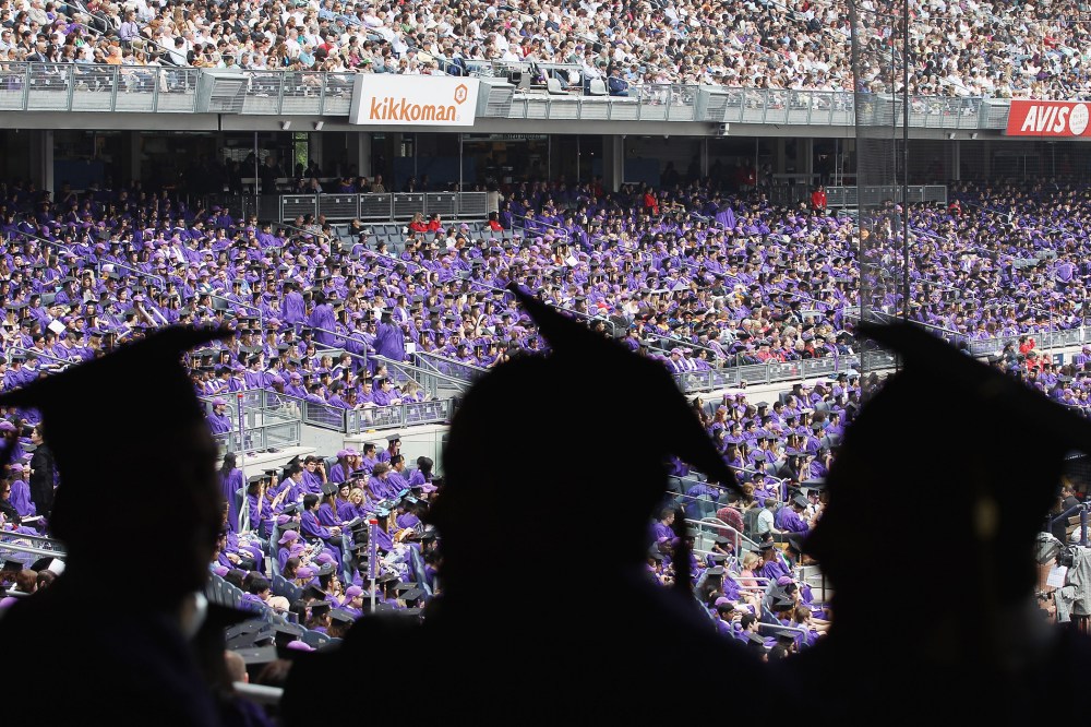 Graduating students attend New York University's commencement ceremony, May 16, 2012 in New York, N.Y.