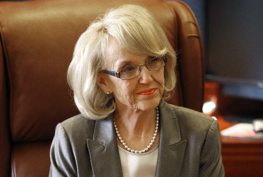Arizona Gov. Jan Brewer at her office in Phoenix on Jan. 10, 2013 (Photo by Matt York/AP Photo)