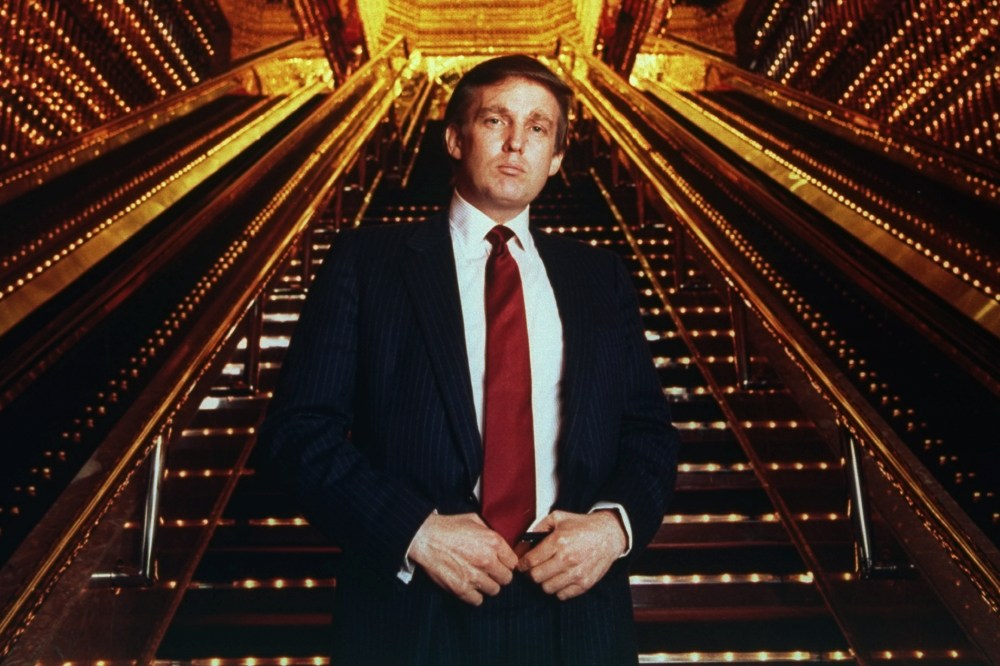 Real estate tycoon Donald Trump poses in Trump Tower atrium, 1989. (Photo by Ted Thai/The LIFE Picture Collection/Getty)