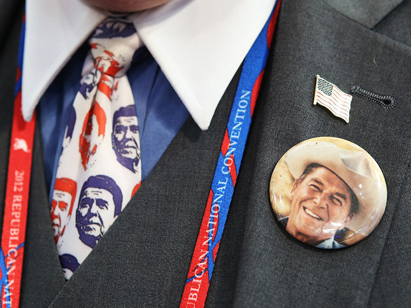 A convention-goer wears a former President Ronald Reagan button and tie during the final day of the Republican National Convention at the Tampa Bay Times Forum on August 30, 2012 in Tampa, Florida. (Photo by Chip Somodevilla/Getty Images)