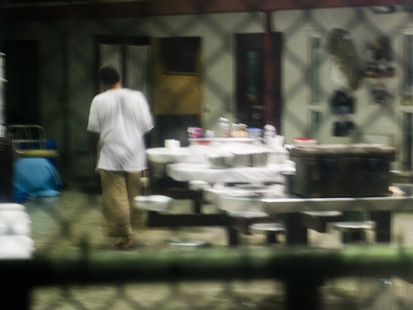 This image reviewed by the US military shot through a one way mirror shows a detainee in Cell Block B of the "Camp Six" detention facility of the Joint Detention Group at the US Naval Station in Guantanamo Bay, Cuba, January 19, 2012. (Photo by Jim...