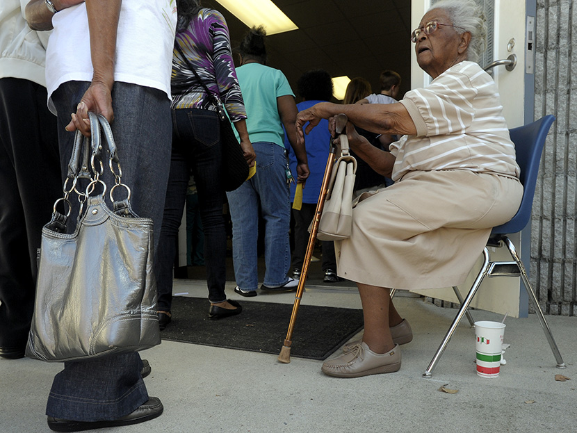 People wait in line to vote at the Board of Elections early voting site on October 18, 2012 in Wilson, North Carolina.  (Photo by Sara D. Davis/Getty Images)