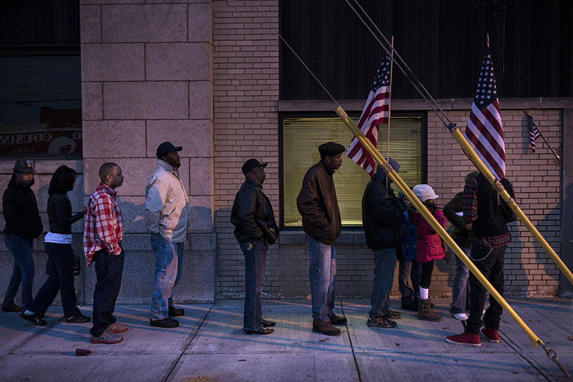 Voters wait in front of the Mt. Pleasant Library November 6, 2012 in Cleveland, Ohio. (Photo by Brendan Smialowski/AFP/Getty)
