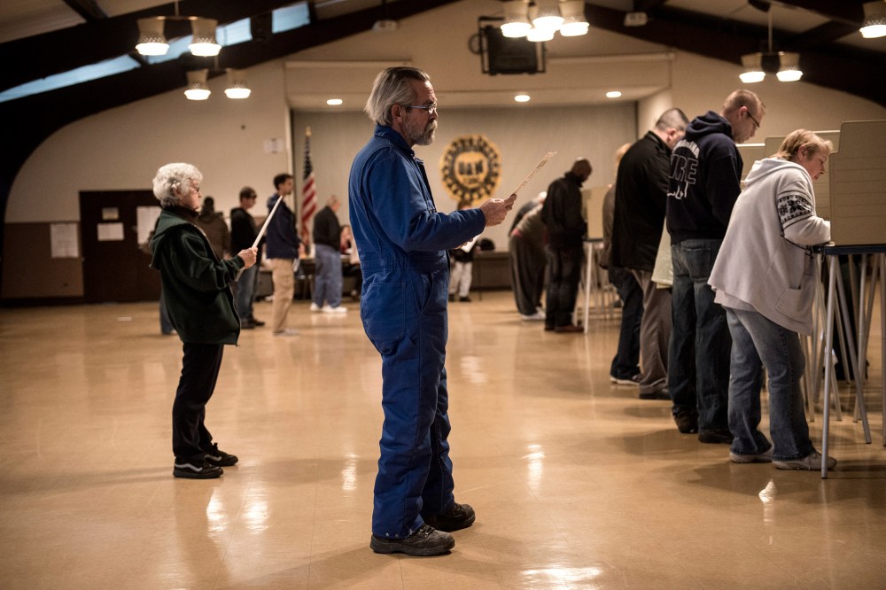 People wait as others vote at the United Auto Workers Local 1250 Hall during election day November 6, 2012 in Cleveland, Ohio.