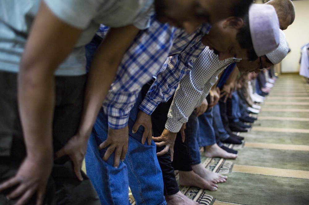 Muslim-American men attend noon-day prayers at the Dar-ul-Islah Mosque on Friday September 28, 2012 in Teaneck, New Jersey.